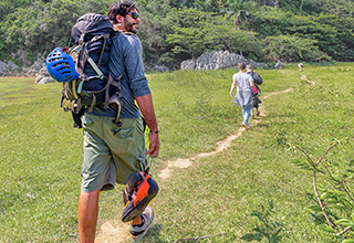 American visits Mural of Prehistory in Viñales Cuba.